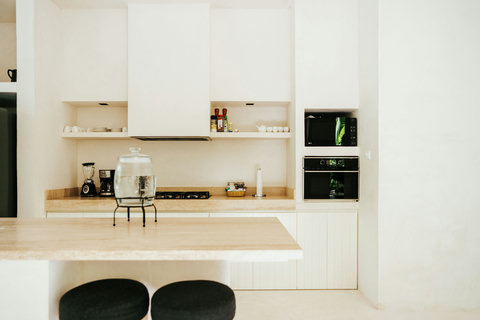 Modern kitchen with minimalist design and breakfast bar