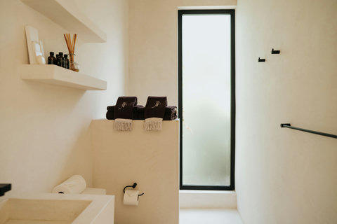 Modern bathroom with sleek fixtures and large window