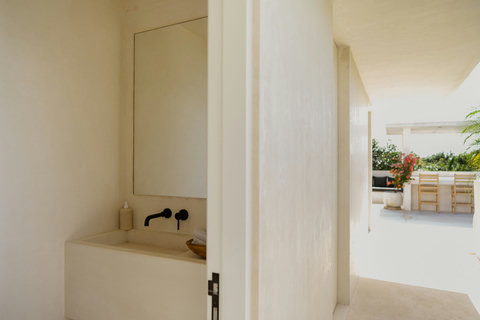Guest bathroom featuring modern touches and a minimalist vibe