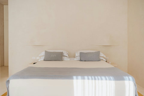 Inviting bedroom with a cozy king bed and natural light