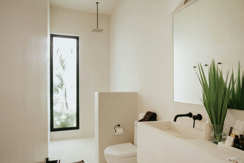Modern bathroom designed with sleek fixtures and natural light
