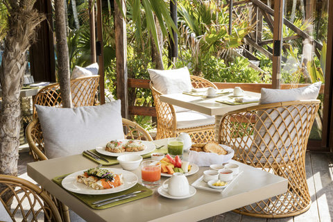 PANDANO RESTAURANT - Morning returns with fresh fruit, bright plates, and a table set for slow starts in golden light.