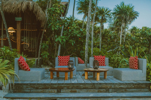 BEACH BAR - Cozy deck seating at dusk
