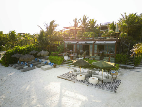 PANDANO RESTAURANT - From the beach, the retreat reveals itself slowly, sun-warmed, tucked into greenery, and beautifully open to the water.