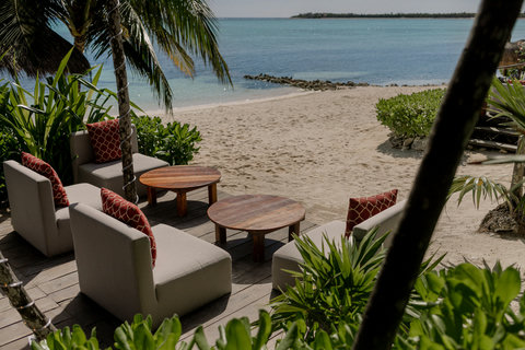 Noon sun returns, same deck gleams brighter; ocean sighs nearby, pillows dry warm from yesterday’s salt spray.