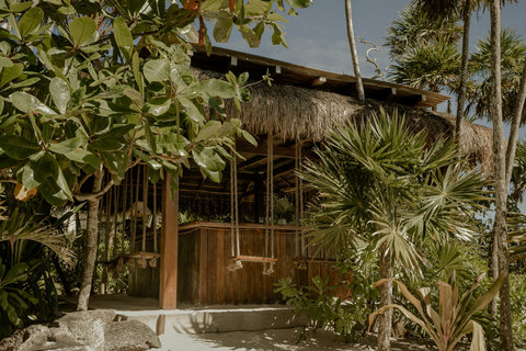 Sheer drape parts; cool corridor breathes stone scent, potted palms guiding footsteps toward stillness and muted voices.
