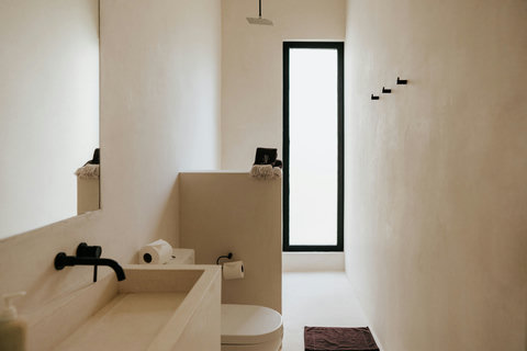 Modern bathroom with sleek fixtures and large window