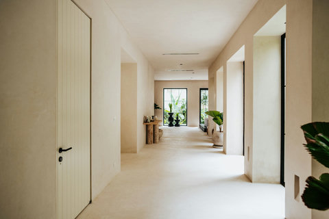 Sunlit space with windows opening to the garden