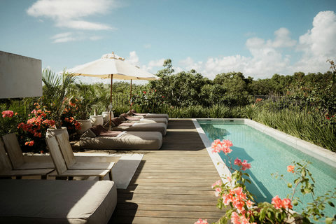 Private rooftop terrace featuring a pool and sweeping green views