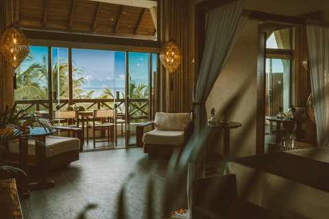 Open-plan suite with ocean breeze balcony