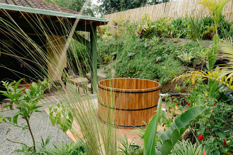 HOT TUB - 🌿 Escape to paradise with this serene haven surrounded by lush greenery. Bask in the golden sunlight while you soak in the rustic charm of the cedar hot tub. Your peaceful retreat awaits! 🌞✨