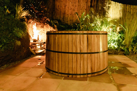 HOT TUB -  Unwind in rustic tranquility beside the crackling fire—your private oasis awaits under the stars. 🌟🛁 #SereneEscape #RelaxInNature