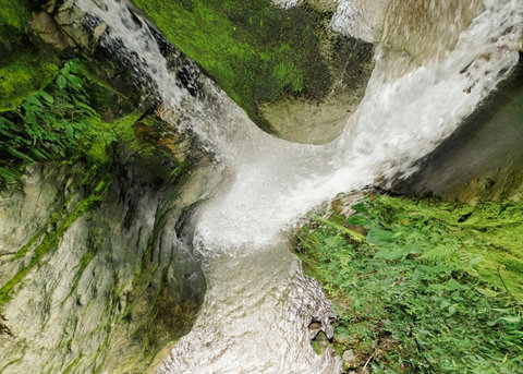WATERFALL - Escape to your private oasis where lush greenery and the soothing sounds of cascading waterfalls create a serene retreat. Reconnect with nature and unwind in this tranquil paradise.