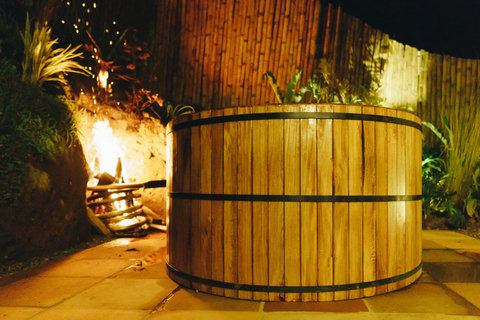 HOT TUB -  Unwind in rustic tranquility beside the crackling fire—your private oasis awaits under the stars. 🌟🛁 #SereneEscape #RelaxInNature