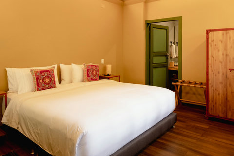 Bedroom - ✨ Escape to serenity in this cozy haven, bathed in warm, inviting hues. Enjoy restful nights on a plush bed surrounded by charming touches and modern amenities. Your perfect retreat awaits. 🛏️🌿