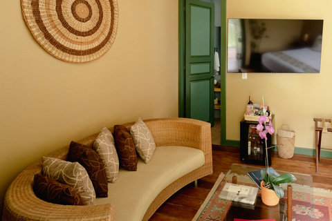 Living Room - Step into serenity with our elegantly lit getaway, featuring cozy seating, lush decor, and every convenience at your fingertips. Perfect for a relaxing escape or a stylish retreat. 🌿✨