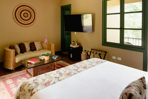 Bedroom - Step into tranquility with our sunlit sanctuary, where cozy warmth and elegant simplicity invite you to unwind. Experience the perfect blend of comfort and charm, complete with plush bedding and thoughtful touches for a restful retreat.