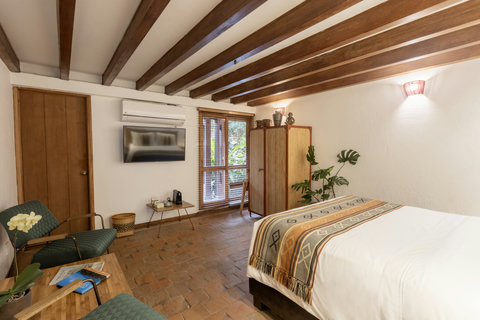 Bedroom 2 - 🌿 Escape to tranquility in this beautifully lit retreat, where rustic charm meets modern comfort. Unwind under the warm glow of ambient lighting, savor your morning coffee on the private patio, and enjoy every luxurious touch designed for your