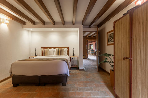 Bedroom 1 - Unwind in rustic elegance 🌿✨ This cozy retreat features warm wood accents, soft lighting, and all the comforts of home. Perfect spot for a rejuvenating escape!