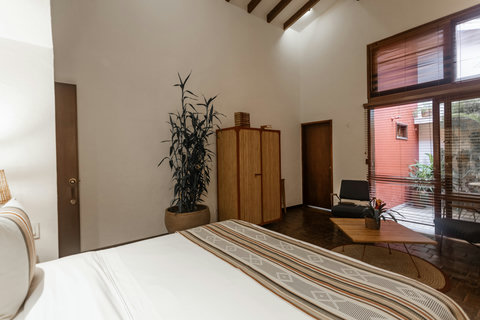 Bedroom 3 - 🌿 Immerse yourself in serene elegance where rustic charm meets modern comfort. Soft ambient lighting, cozy furnishings, and a private garden view make this the ultimate escape. Unwind, relax, and enjoy every moment in this tranquil haven. ✨