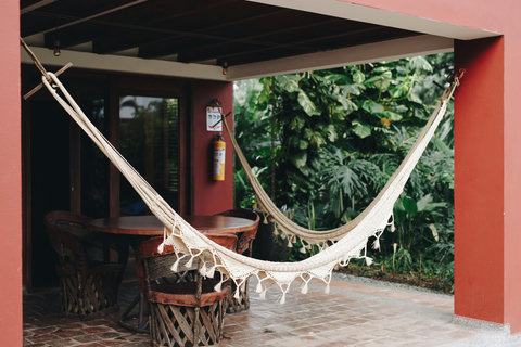 Patio - 🌿 Serenity Awaits! 🌿 Bask in the warm glow of the setting sun on your private terrace hammock, surrounded by lush greenery. Perfect for unwinding, this cozy hideaway offers the ultimate blend of comfort and natural beauty. 🍃☀️ Unplug and indulge i