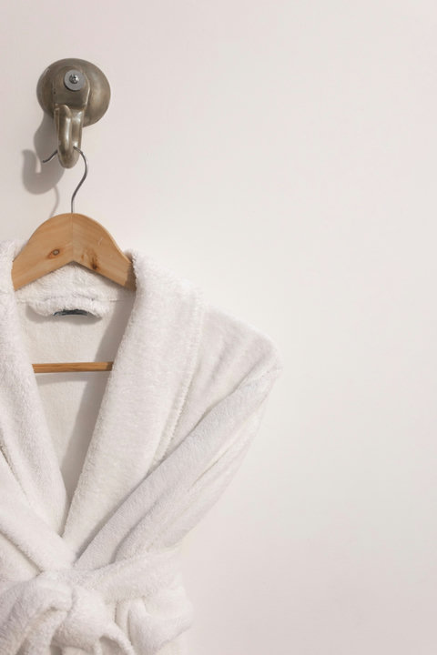Bathroom Amenity - Indulge in ultimate relaxation with our soft, cozy robes awaiting you in a serene, well-lit retreat. Perfect for unwinding after a day of exploration or enjoying a leisurely morning with ample amenities at your fingertips.
