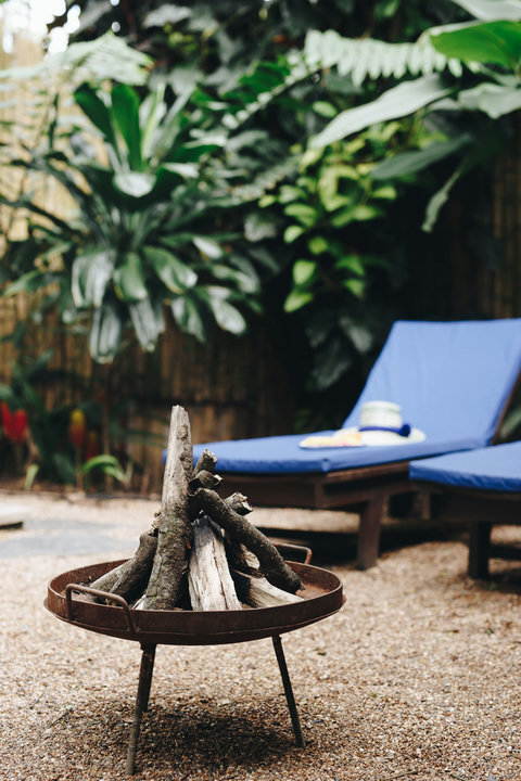 Patio - 🌿 Embrace tranquility in this lush outdoor oasis! Unwind on the cozy lounge chairs, illuminated by the soft glow of a starlit fire pit. Perfect for magical evenings or lazy afternoons. 🌙✨ #RelaxationRetreat #NatureVibes #FirePitEvenings