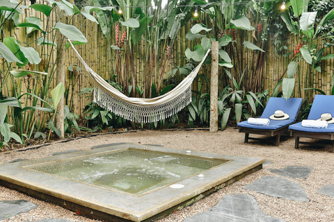 Pool area: 🌿✨ Escape to your private jungle oasis! Relax in the hammock under twinkling string lights, or soak in the floral-infused paradise of your own secluded plunge pool. Perfect for unwinding and reconnecting with nature. 🏝️💫