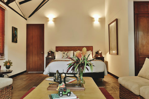 Bedroom 3 - Step into serenity with this charming retreat, where soft lighting and elegant decor create a warm and inviting haven. Unwind in a cozy bed, surrounded by tastefully curated art and thoughtful amenities, ensuring a restful and inspiring stay.