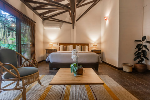 Bedroom 2 - Immerse yourself in tranquility with soft ambient lighting, cozy furnishings, and nature at your doorstep. Your serene retreat awaits.