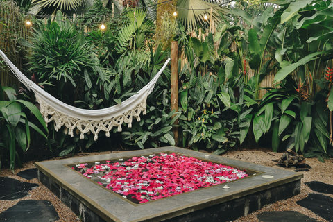 Patio Pool - Escape to your private oasis, where lush greenery meets the soft glow of string lights. Relax in a cozy hammock or unwind in the flower-filled serenity of the refreshing pool. Your paradise awaits!