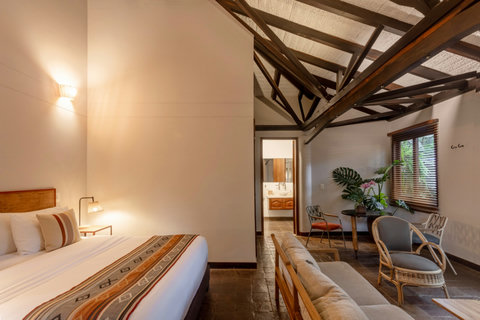 Bedroom 2 - Bask in the warmth of rustic charm with modern comforts! This cozy retreat boasts ambient lighting, inviting décor, and all the amenities you need for a serene getaway. Perfect for unwinding and soaking in nature's beauty right from the comfor