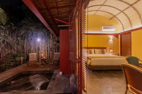 Bedroom 1 - ✨ Escape to tranquility in this enchanting retreat, where the warm glow of ambient lighting meets the soothing allure of a private plunge pool. Unwind in serene luxury with modern amenities, set against a backdrop of lush greenery. 🛏️🌿 #Paradi