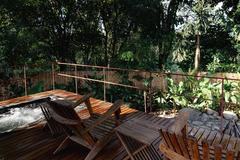 balcony hot tub - Escape to your own private oasis where lush greenery and tranquil surroundings embrace you. Unwind on the sun-kissed deck with a soothing soak in the hot tub, as nature's serenade sets the perfect backdrop for relaxation and rejuvenation