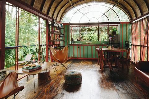 Living room 2 - Step into your private jungle oasis, where rustic charm meets modern comfort. Bask in the glow of natural light filtering through lush greenery, while enjoying a cup of coffee in cozy, inviting spaces perfect for relaxation and inspiration