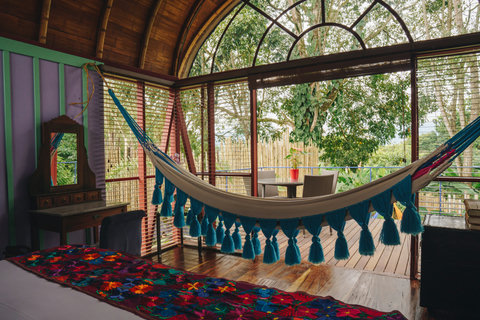 Bedroom 2 - 🌿 Escape to this tranquil hideaway drenched in natural light, where lush greenery meets rustic elegance. Unwind in the cozy hammock with a book or savor your morning coffee on the serene patio. Perfect for those seeking a peaceful retreat with