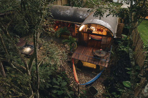 Garden Villa - Escape to a serene jungle oasis where magical lighting and lush greenery create the perfect backdrop for relaxation. Unwind in the cozy hammocks, soak in the bubbling hot tub, and let nature’s symphony lull you to tranquility. Your paradise