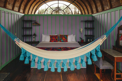 Bedroom 4 - ✨ Escape to a world of color and relaxation in this vibrant sanctuary, where natural light dances off cozy, eclectic decor. Unwind in the plush bed or sway gently in the hammock, letting the serene atmosphere embrace you. Your perfect retreat