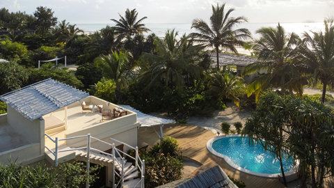 From above, it all feels even quieter, your own pocket of green, sea air, and slow island ease.