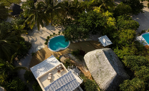 End the day above the palms, with sunset light, a quiet rooftop, and that rare feeling of having nowhere else to be.