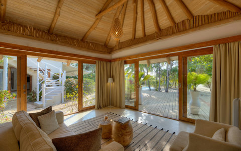 Come back from the sun to soft shadows, airy interiors, and a living space made for slow chats and deeper exhale.