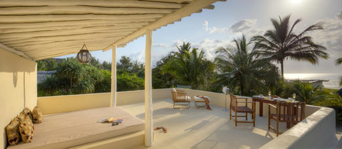 Claim the rooftop for the afternoon, stretched out in filtered sun, with fruit, coffee, and a breeze worth lingering for.