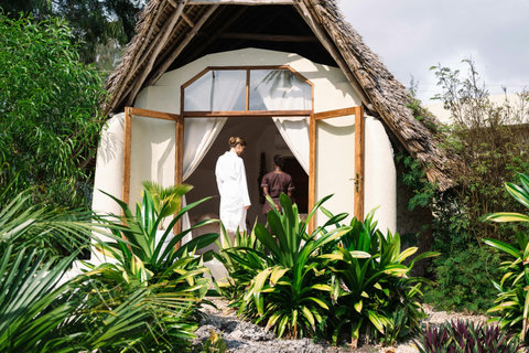 Back on shore, hidden paths and soft greenery make each small ritual feel private, slow, and beautifully unhurried.