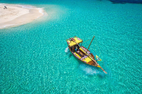 Dhow Journey - 40 min transfer Full-day adventure along the southern coast. Snorkeling, sandbanks, and fresh seafood lunch included.