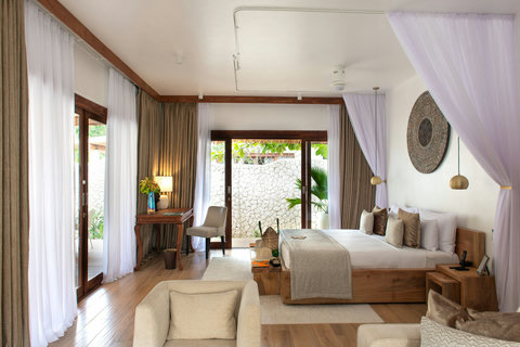 Morning light drifts in from every side, inviting bare feet, quiet coffee, and that first deep exhale of arrival.