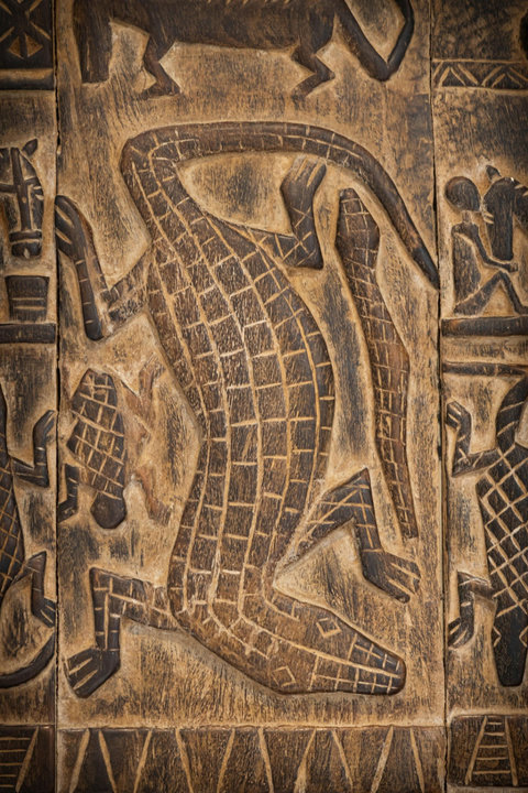 Carved textures catch the eye like a whispered story, grounding the room in craft, heritage, and stillness.