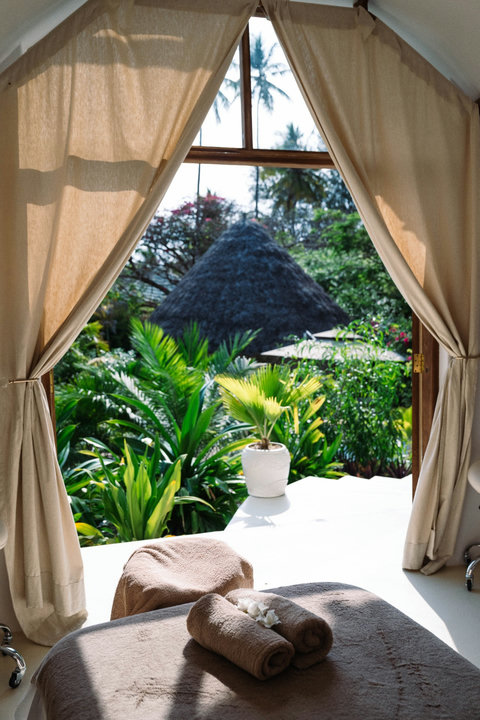 Soft towels, filtered light, and a view framed like a postcard, you settle into stillness.