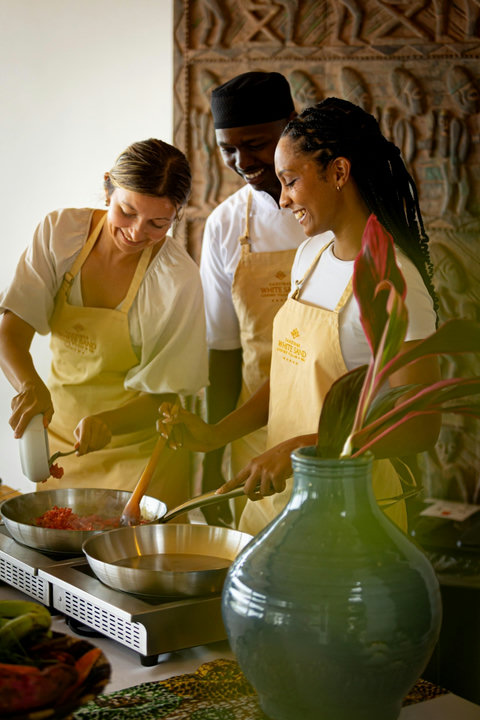 Hands busy, laughter low, spices warming the room, learning a new rhythm at an unhurried pace.