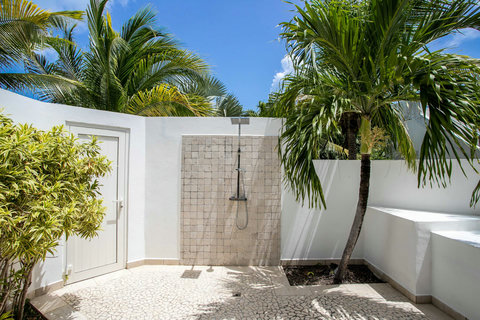 Outdoor shower on private patio of Bedroom 3