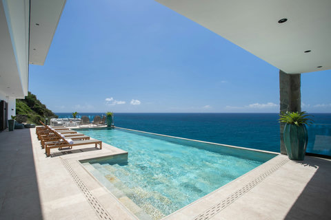 Swimming Pool and Lounge Chairs